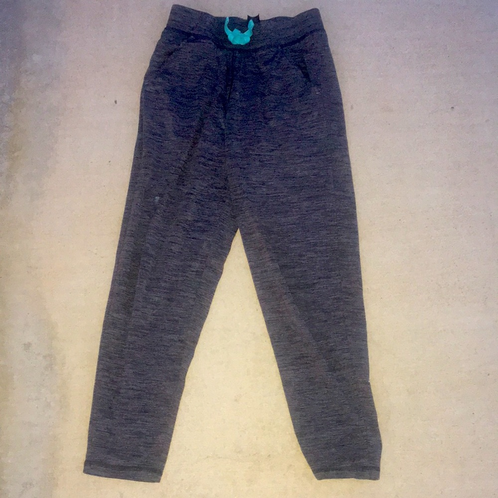 Gray sweat pants with a teal bow in the size 6x in kids has been only worn twice